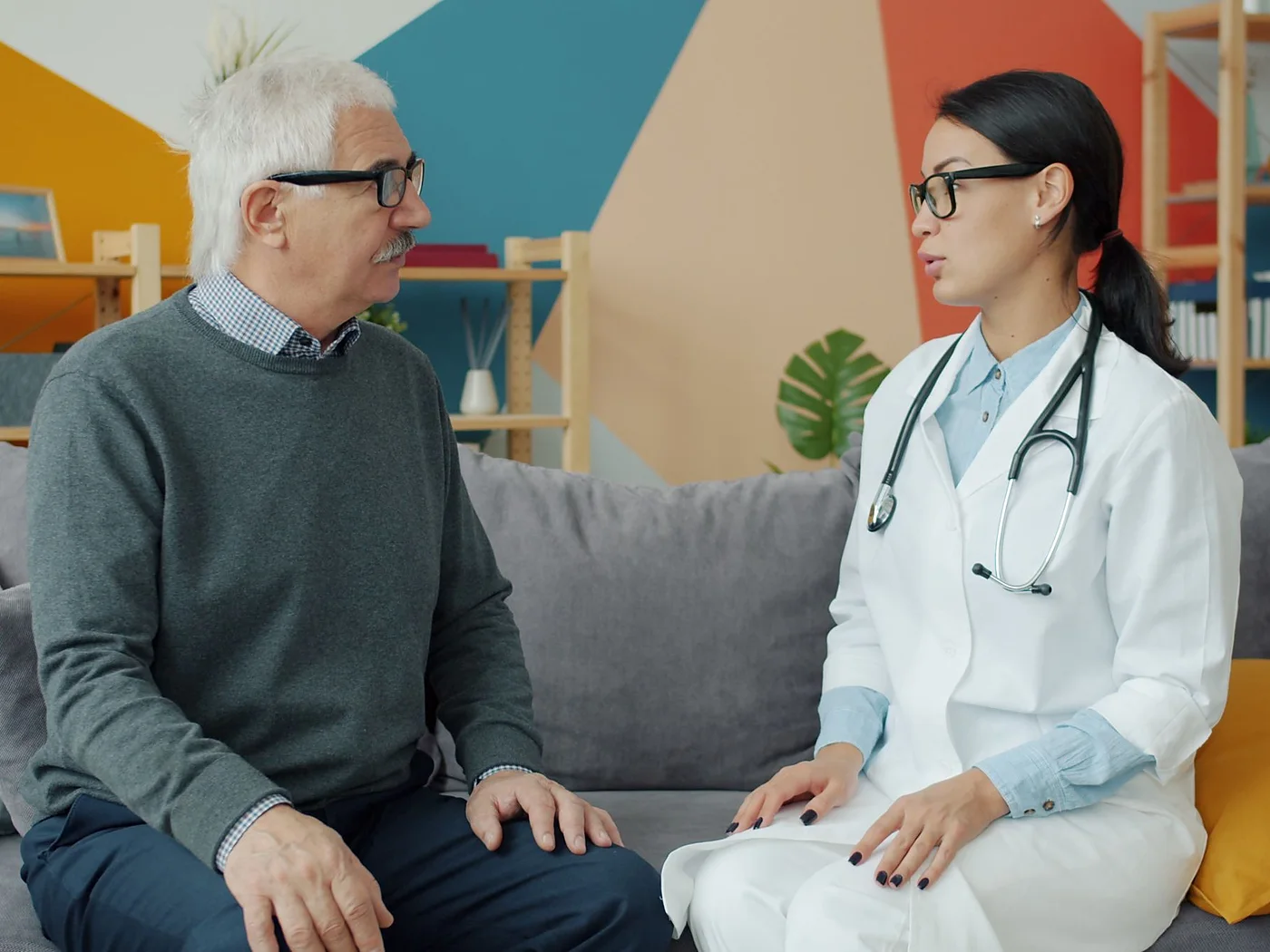 A man talking with his doctor before starting a supplement